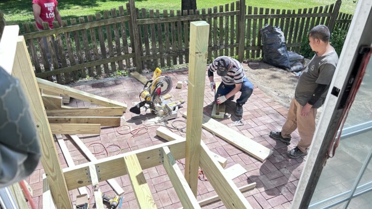 Backyard deck and exterior stair remodeling, new concrete base, paved patio bricks, home renovation project in NY‑NJ