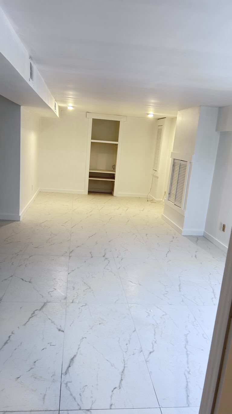 Before and after full basement renovation in New Jersey — from old space to finished tile floors and cement board walls